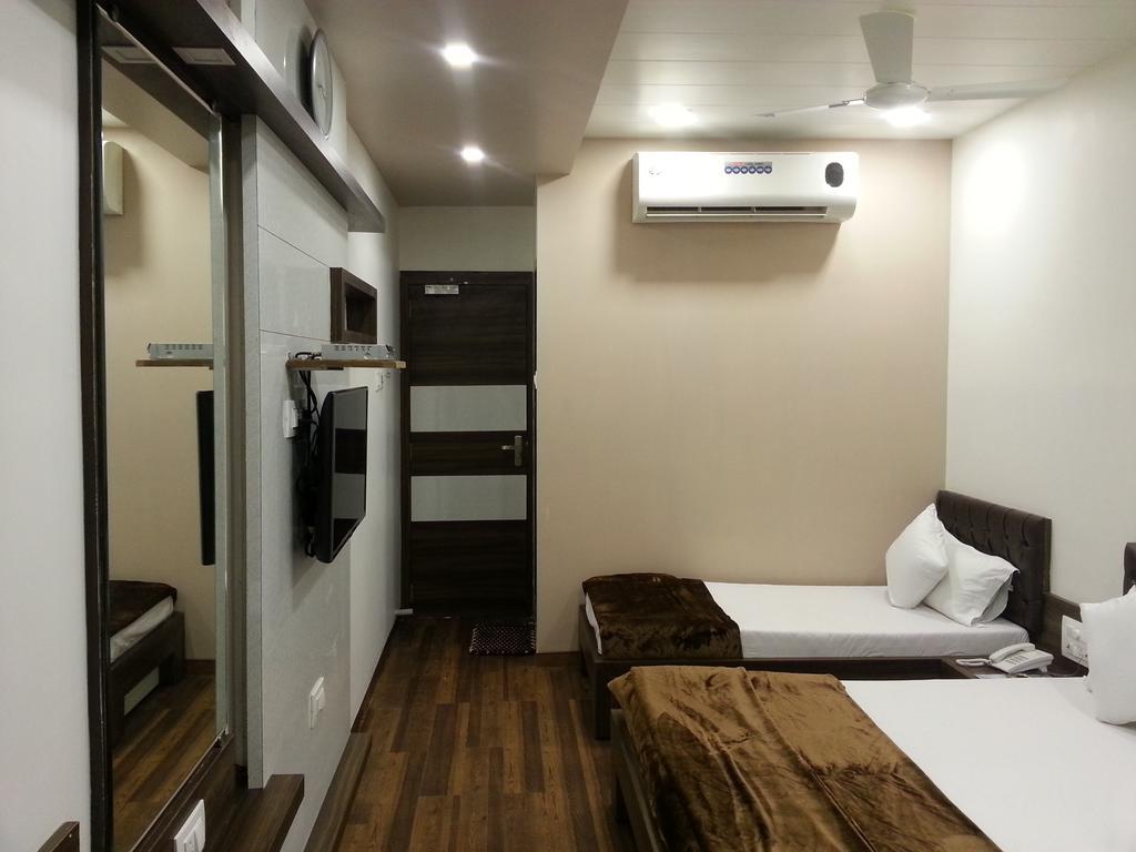 Hotel Oasis Mumbai Zimmer foto