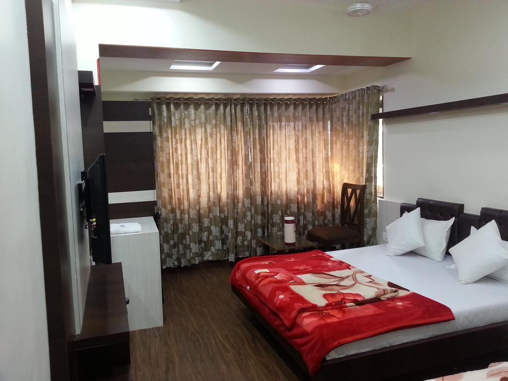 Hotel Oasis Mumbai Zimmer foto